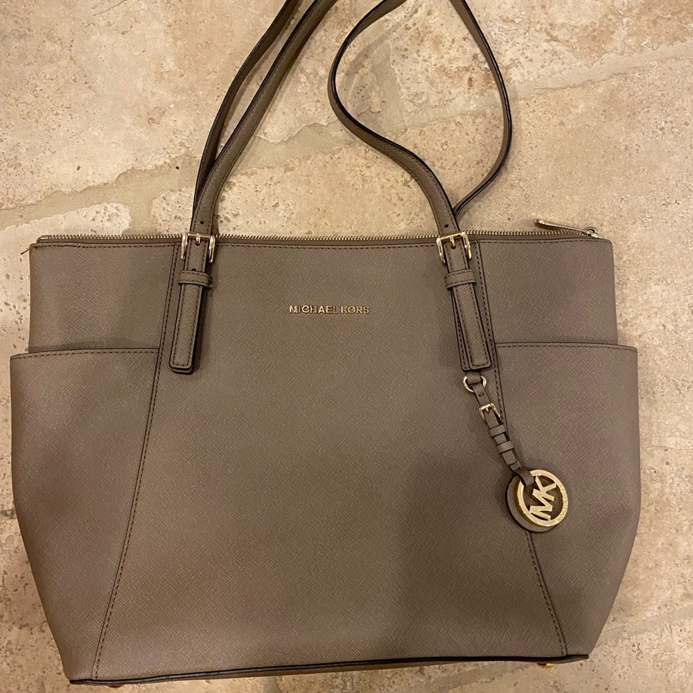 Over the shoulder Michael Kors purse
